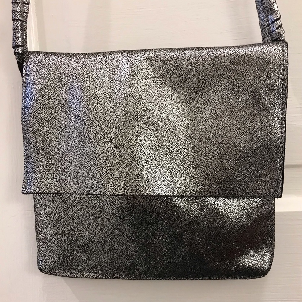 Silver leather crossbody purse.
